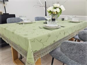 Obrus plamoodporny FLORES z gipiurą kolor zielony/groszkowy.