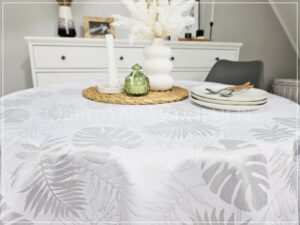 Obrus plamoodporny DE LUX MONSTERA SREBRNA wykończony srebrną lamówką