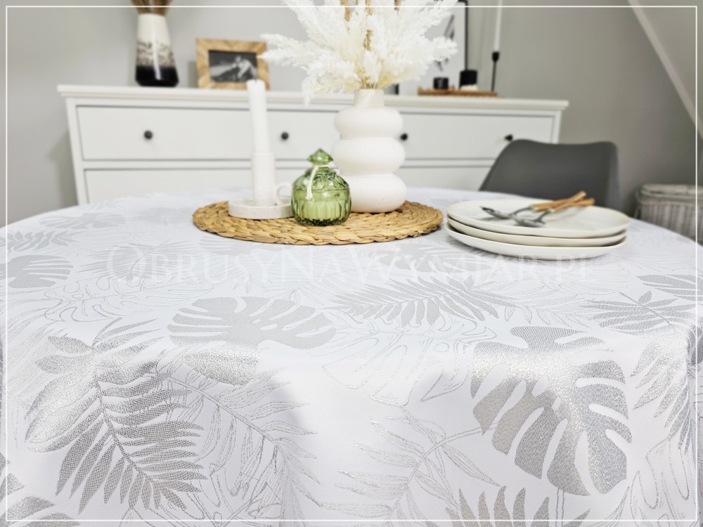 Obrus plamoodporny DE LUX MONSTERA SREBRNA wykończony srebrną lamówką